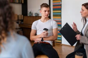 close-up-people-therapy-meeting_23-2148913062